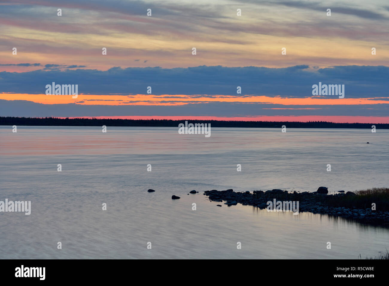 Sunrise over the MacKenzie River, Fort Providence, Northwest Territories, Canada Stock Photo