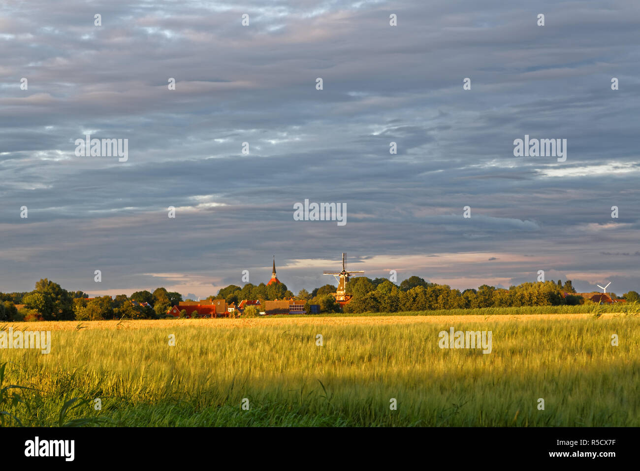 evening sky over rysum in east frisia Stock Photo