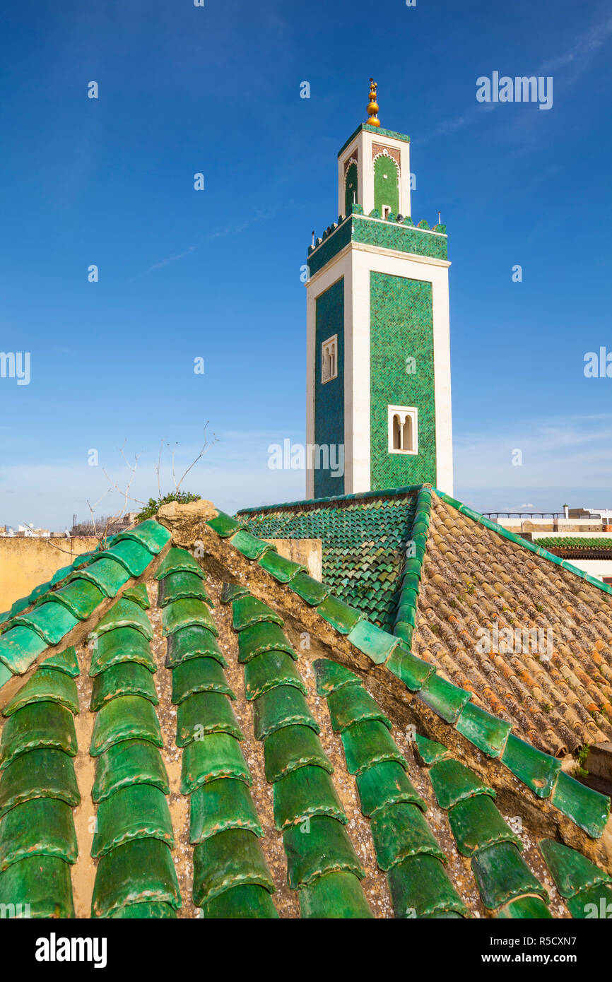 Minaret and rooftop, Bou Inania Medersa, Medina, Meknes, Morocco Stock Photo