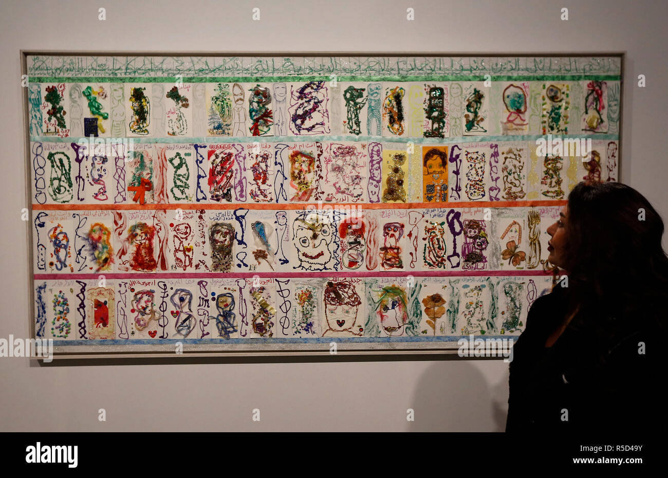 Beirut, Lebanon. 30th Nov, 2018. A woman views an artwork at the "Break