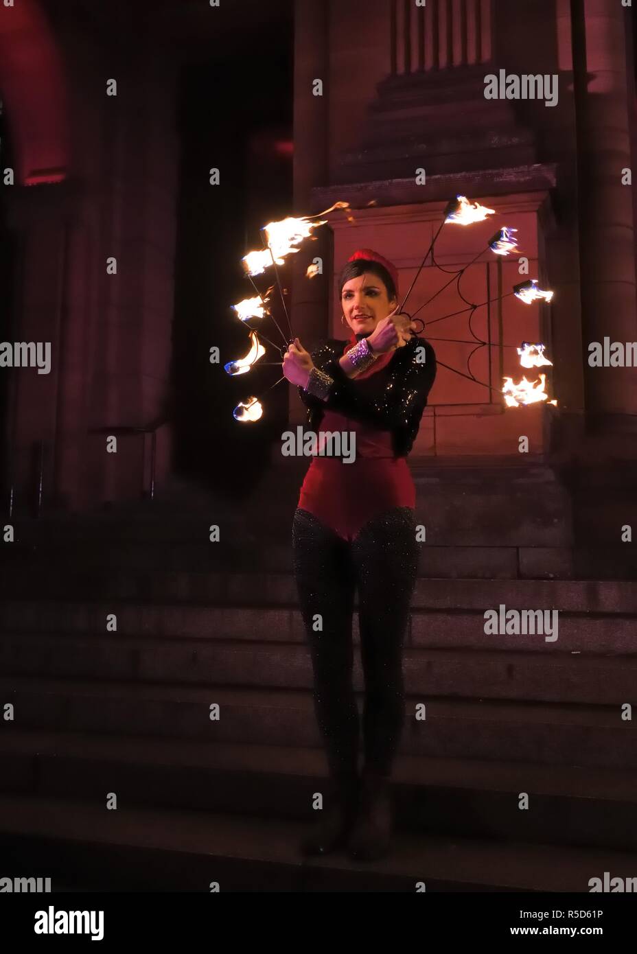 30th, November, 2018. Glasgow, Scotland, UK, Europe. West End Festival. A fire spinner at the St Andrew's Day Torchlight Parade as part of Event Scotland's Winter events programme. Stock Photo