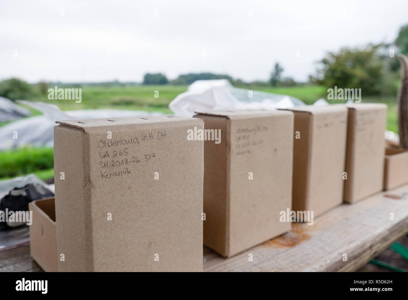 Oldenburg, Germany. 11th Sep, 2018. Boxes with ceramic finds from the