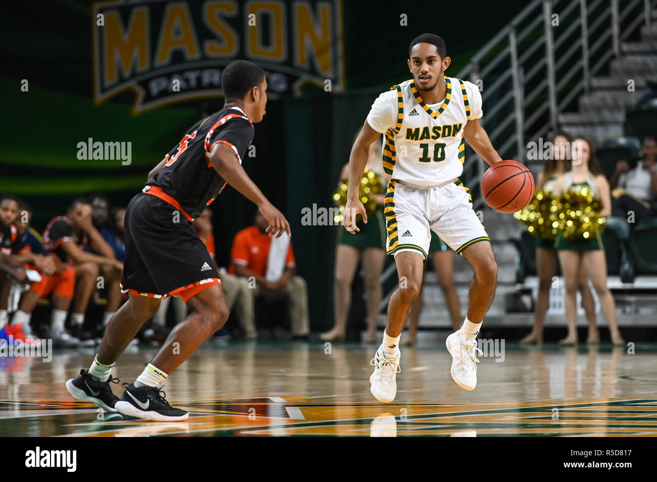 Fairfax, Virginia, USA. 28th Nov, 2018. SHERYWN DEVONISH (5) defends against JAMAL HARTWELL II (10) during the game held at Eaglebank Arena in Fairfax, Virginia. Credit: Amy Sanderson/ZUMA Wire/Alamy Live News Stock Photo