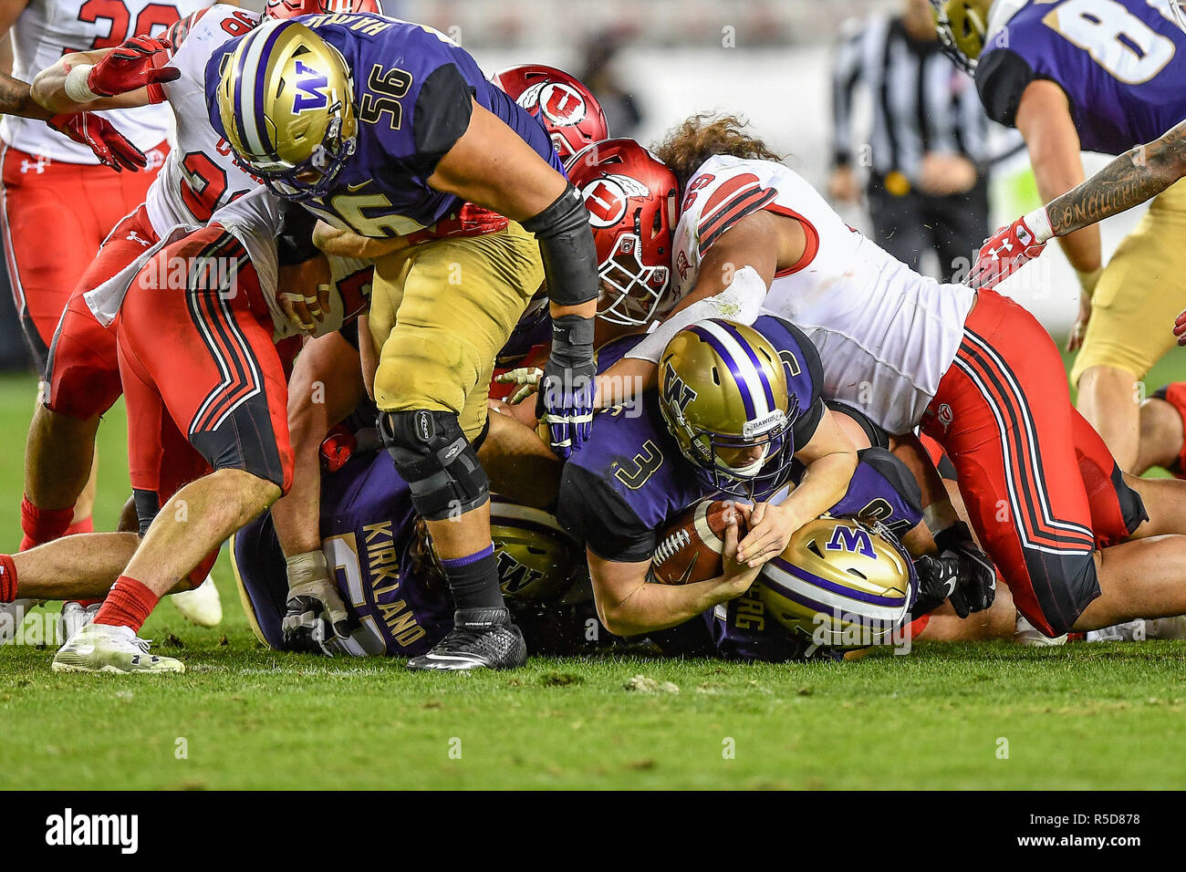 Santa Clara, California, USA. 30th Nov, 2018. Washington Huskies quarterback Jake Browning (3) makes the first down on a keeper during the NCAA PAC-12 Football Championship game between the Utah Utes and the Washington Huskies at Levi's Stadium in Santa Clara, California. Chris Brown/CSM/Alamy Live News Stock Photo