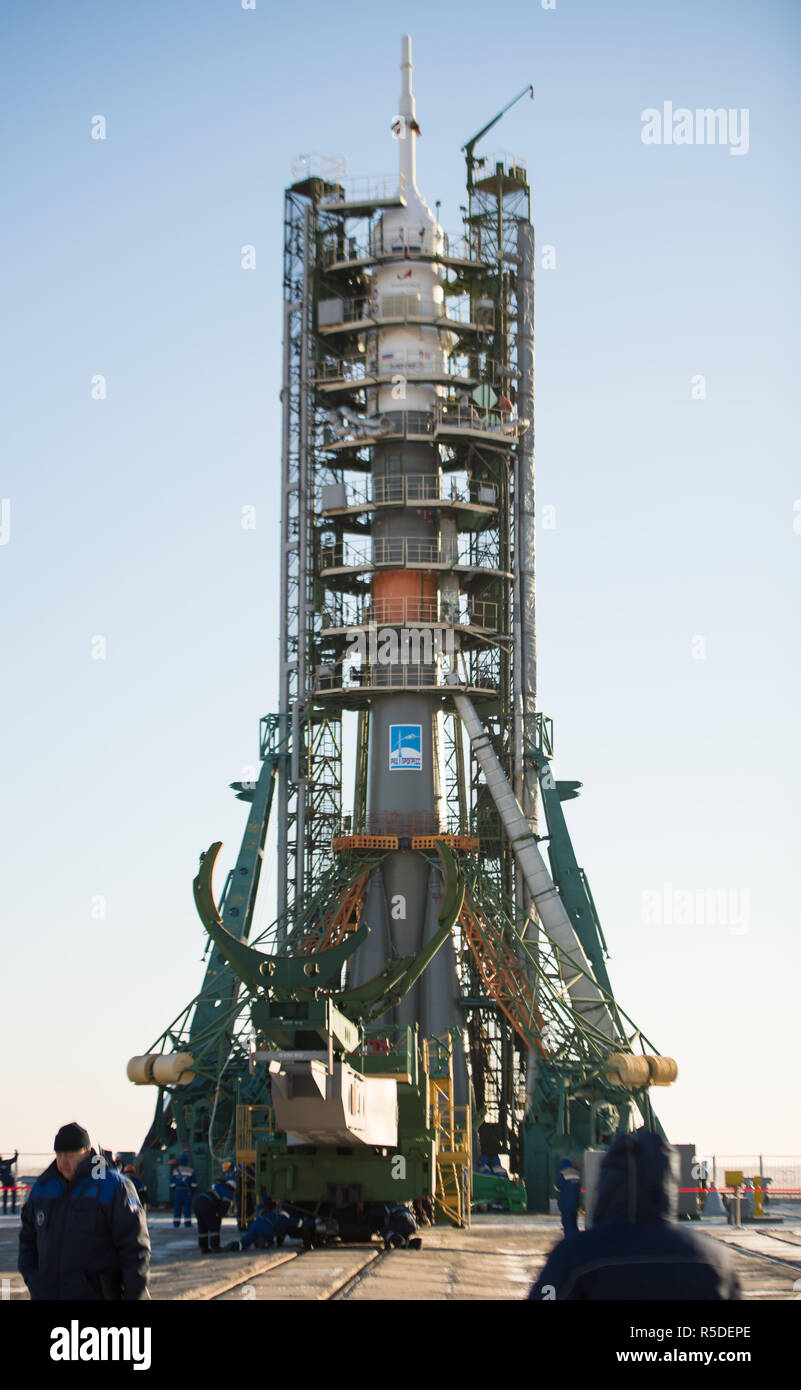 Baikonur, Kazakhstan, 1st December 2018. The gantry arms secure the Soyuz booster rocket and MS-11 spacecraft on the launch pad early morning at the Baikonur Cosmodrome December 1, 2018 in Baikonur, Kazakhstan. The rocket will carry Expedition 58 crew members Russian Oleg Kononenko of Roscosmos, American Anne McClain and Canadian David Saint-Jacques to the International Space Station on December 3rd. Credit: Planetpix/Alamy Live News Stock Photo