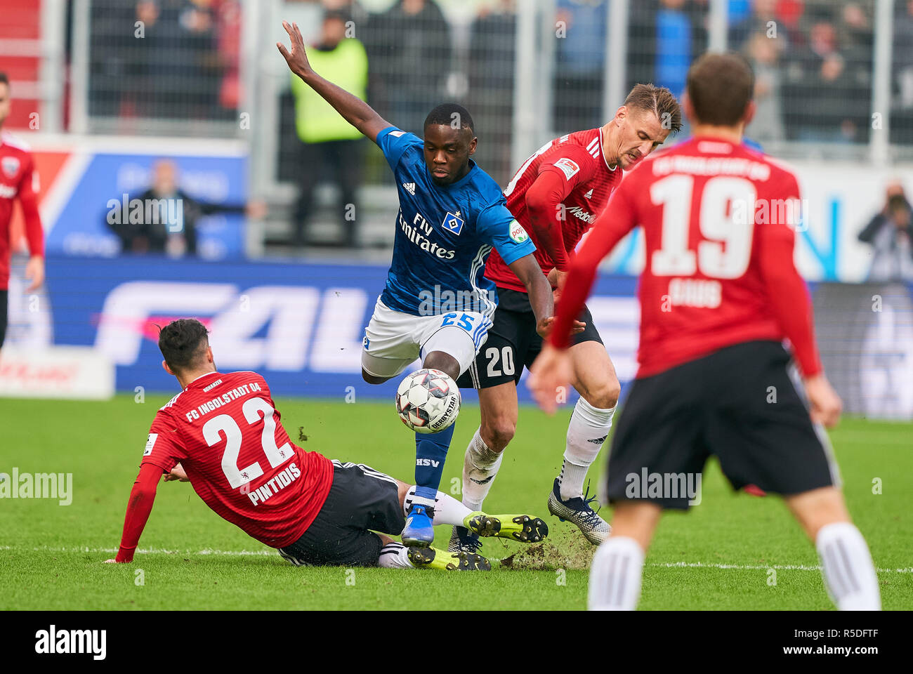 Ingolstadt, Germany, 1st December 2018.Germany, 1st December 2018. Orel MANGALA, HSV 25  compete for the ball, tackling, duel, header, action, fight against Georgios PINTIDIS, ING 22 Stefan KUTSCHKE, ING 20  FC INGOLSTADT - HAMBURGER SV   - DFL REGULATIONS PROHIBIT ANY USE OF PHOTOGRAPHS as IMAGE SEQUENCES and/or QUASI-VIDEO -  2.German Soccer League , Ingolstadt, December 01, 2018  Season 2018/2019, matchday 15, HSV, Schanzer © Peter Schatz / Alamy Live News Stock Photo