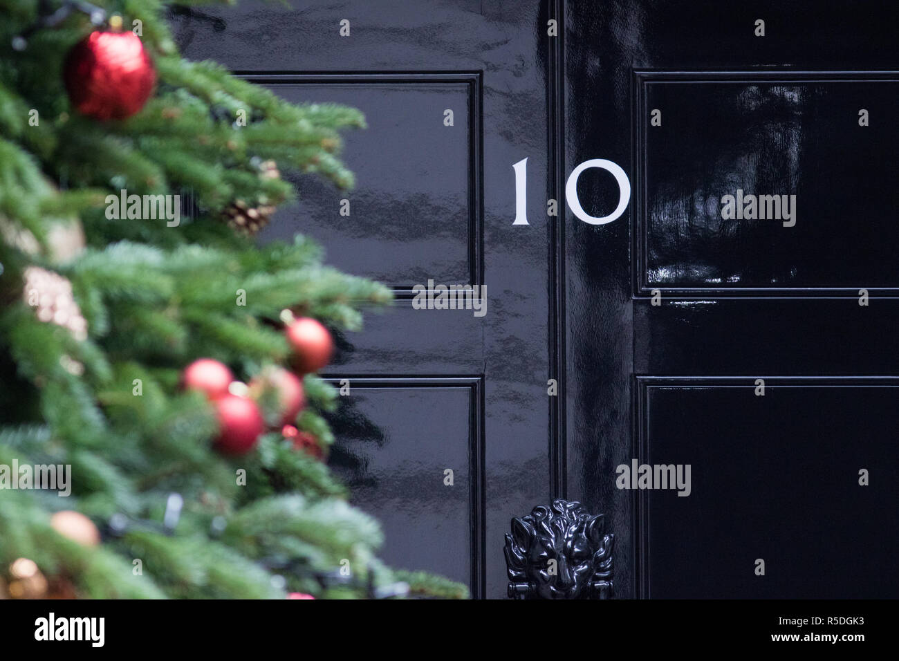 Downing Street, London, UK. 1st December 2018. A giant spruce Christmas tree with decorations is installed in front of the Prime Minister's Residence at 10 Downing Street London. Prime Minister Theresa May has threatened  to 'cancel Christmas' for Brexit if she loses the meaningful vote on 11 December and Brexit Deal Agreement is voted down. Credit: amer ghazzal/Alamy Live News Stock Photo