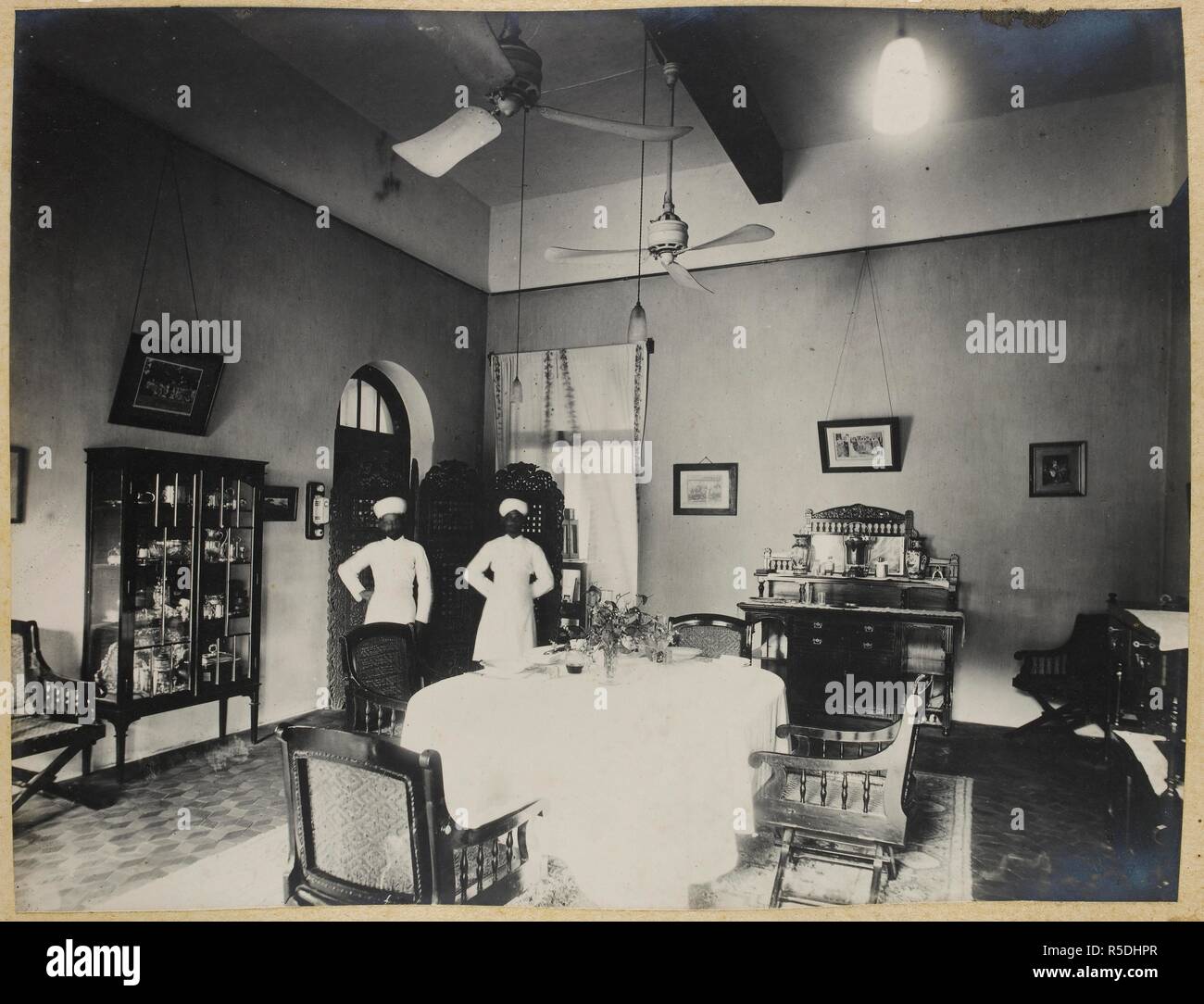 Dining Room, [showing servants in a bungalow, Kanchrapara]. 1920s ...