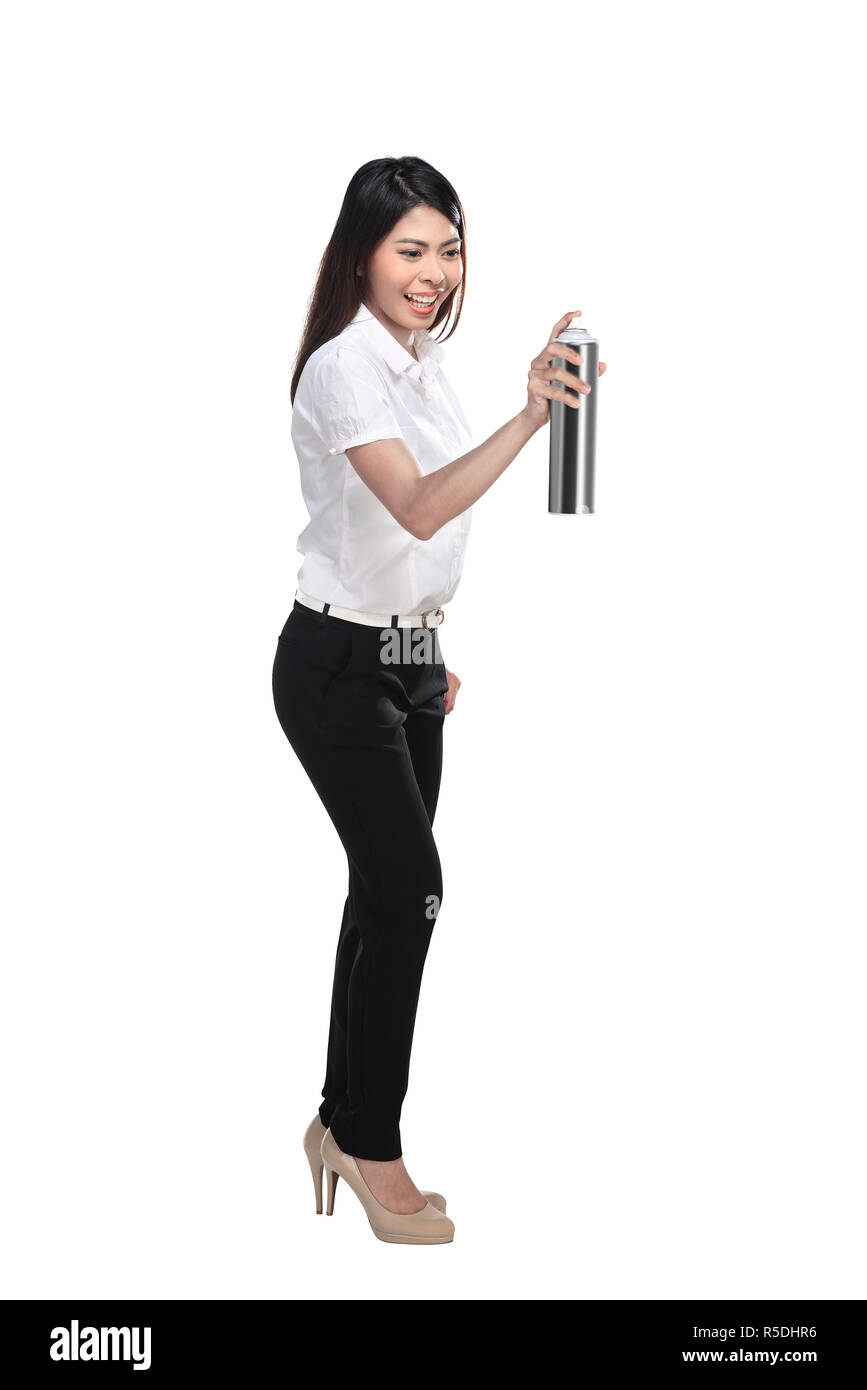 Asian business woman spraying something Stock Photo