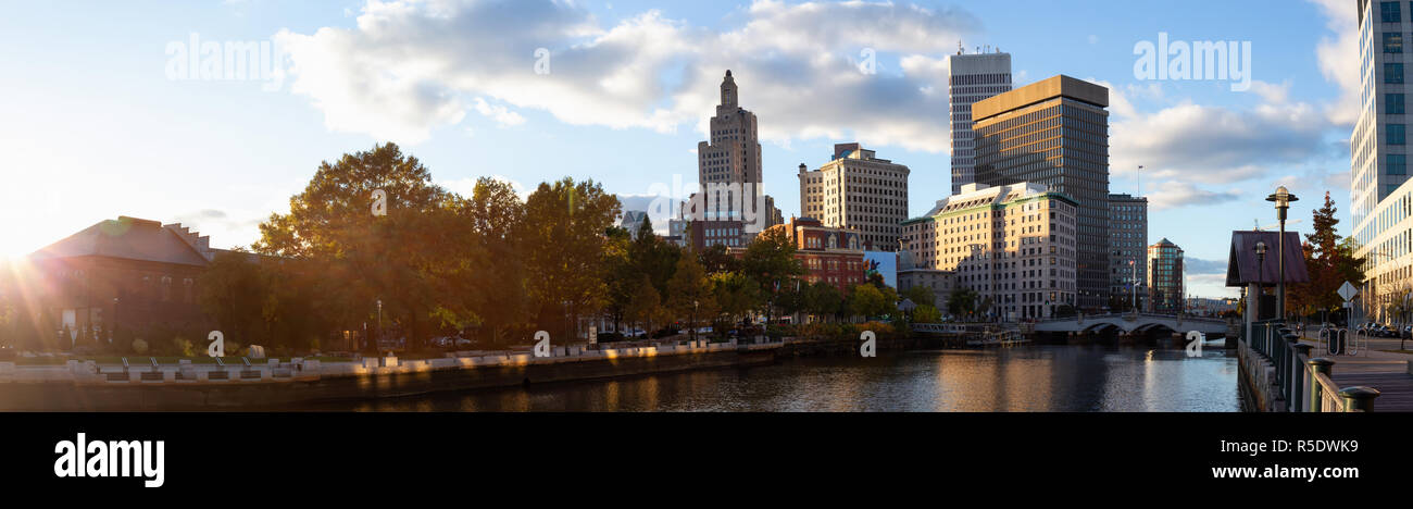 Panoramic view of a beautiful modern city during a vibrant sunset ...