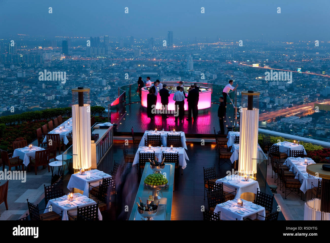 Open airbar 'Sirocco Sky Bar' and Bangkok in the evening, State Tower