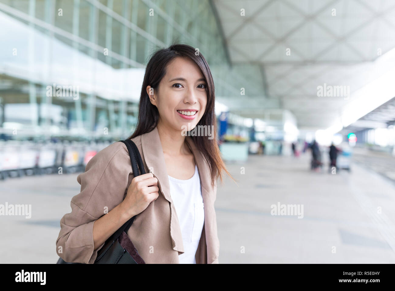 Woman go travel in Hong Kong airport Stock Photo - Alamy