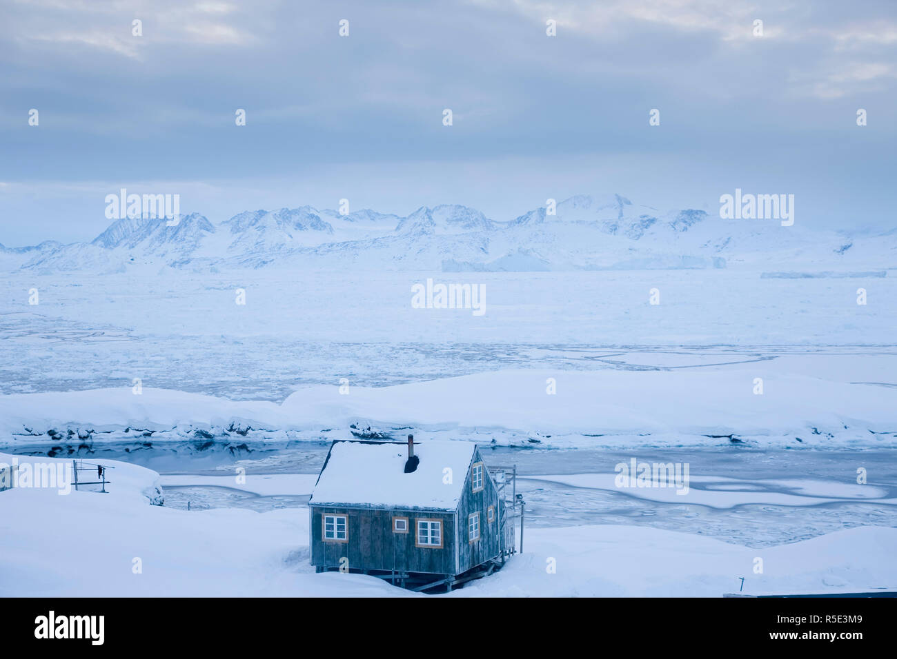 House in snow, Tiniteqilaq, E. Greenland Stock Photo