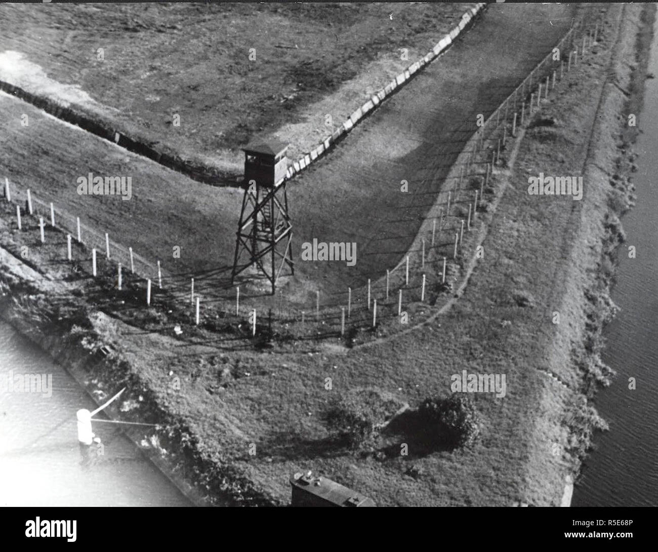October 1961 - Berlin, October Neukoelln, The Teltow Canal Connects With the Neukoellner Eastern Harbor and the Britzer Canal and Builds the Border The East and West Berlin. A Watch Tower Was Erected at the Intersecting Parts of 2 Canals Where the Volkspolzei Shoot an Escapee. Stock Photo