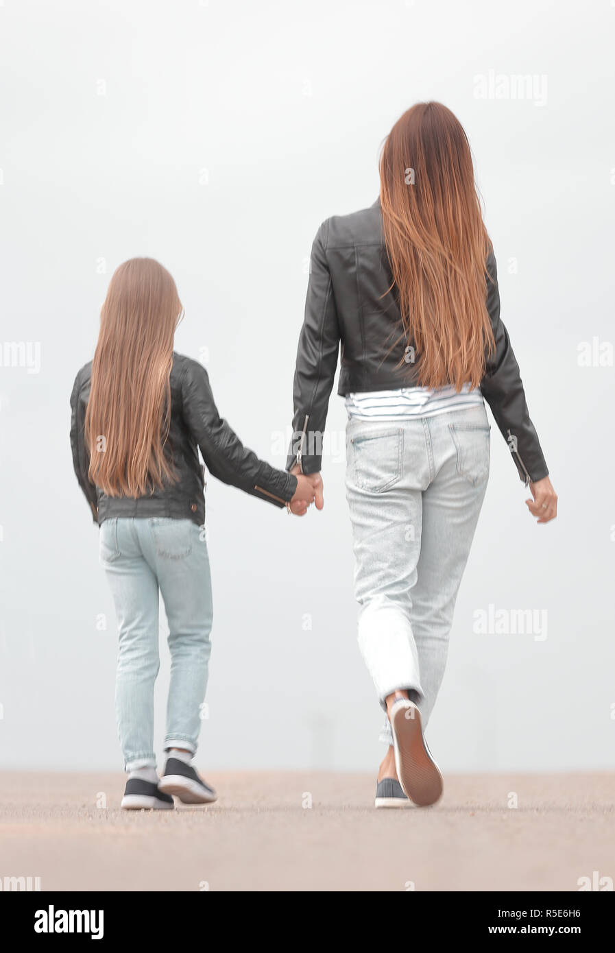 Baby girl mother rear view hi-res stock photography and images - Alamy