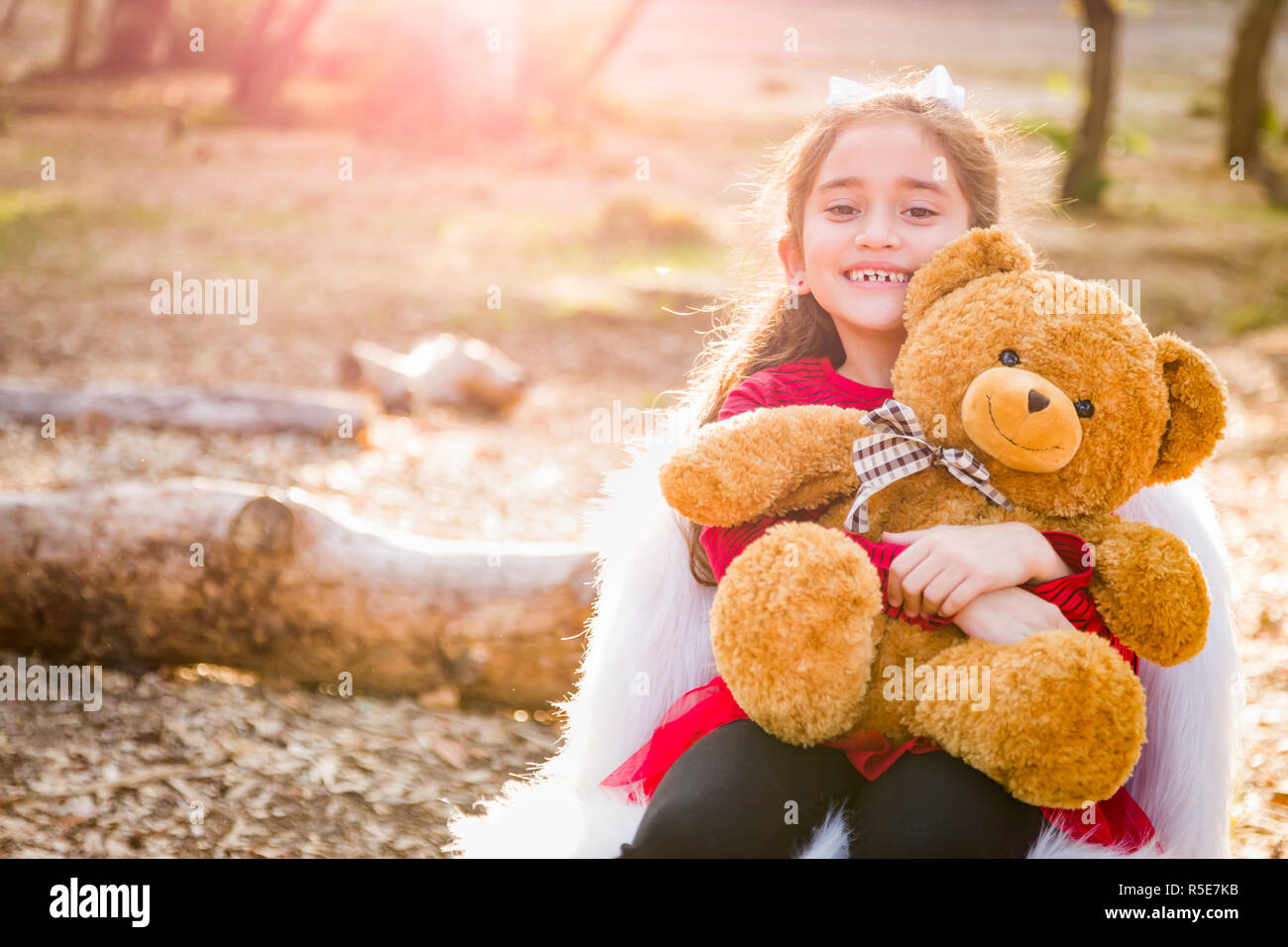 girl hug teddy bear