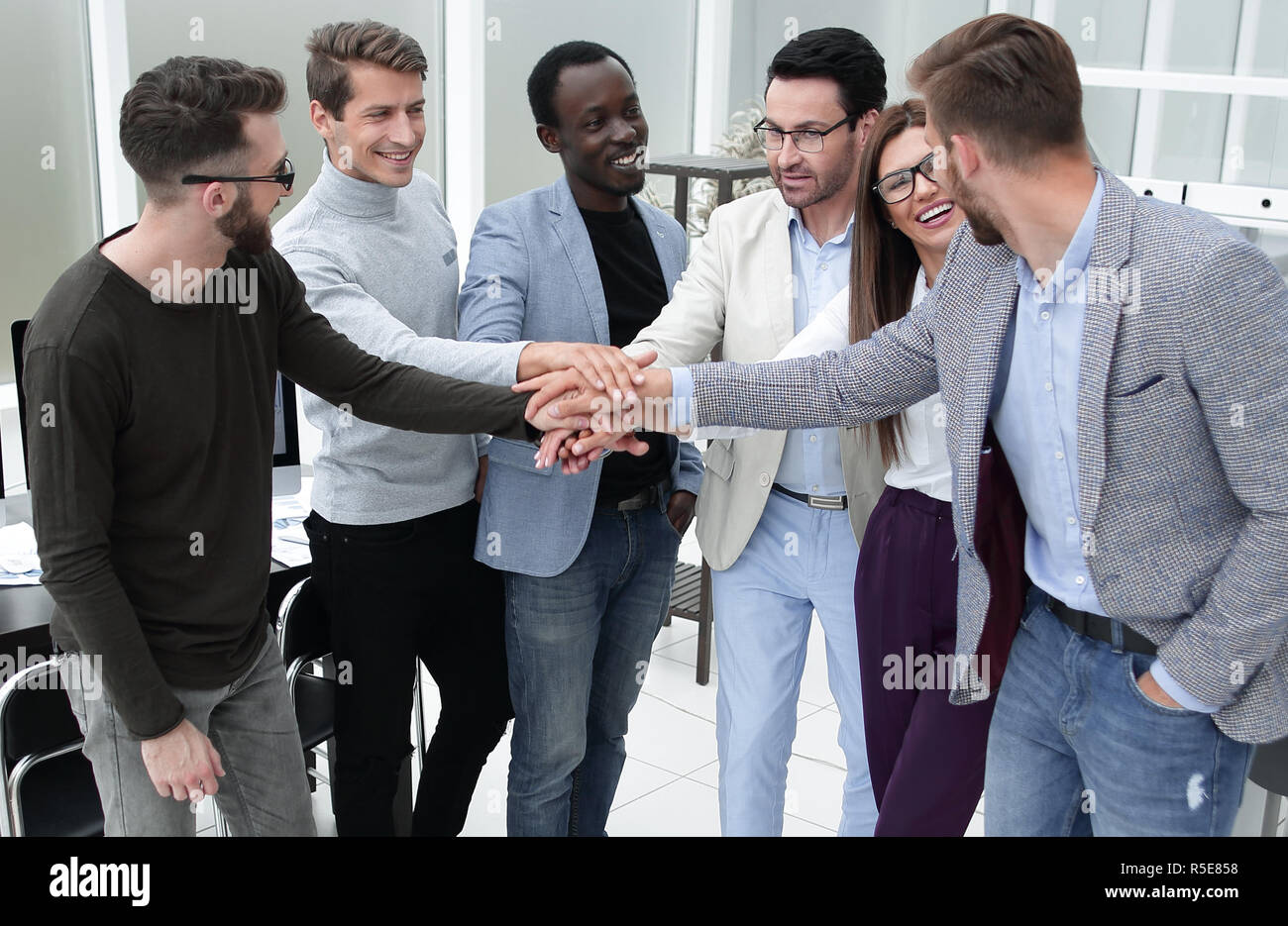 professional business team showing their unity Stock Photo - Alamy