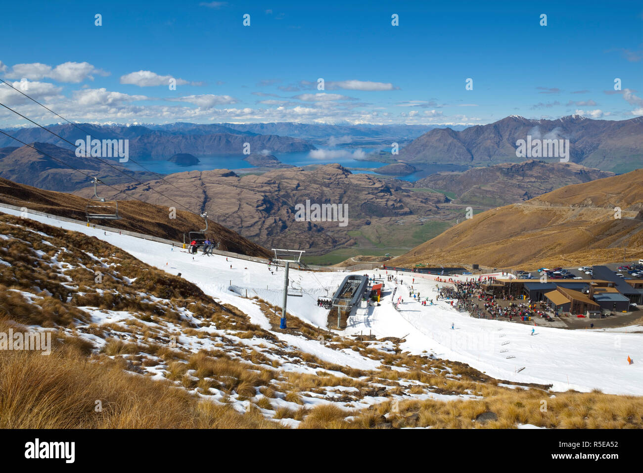 Ski lift & base overlooking Lake Wanaka, Treble Cone, Wanaka, Central Otago, South Island, New Zealand Stock Photo