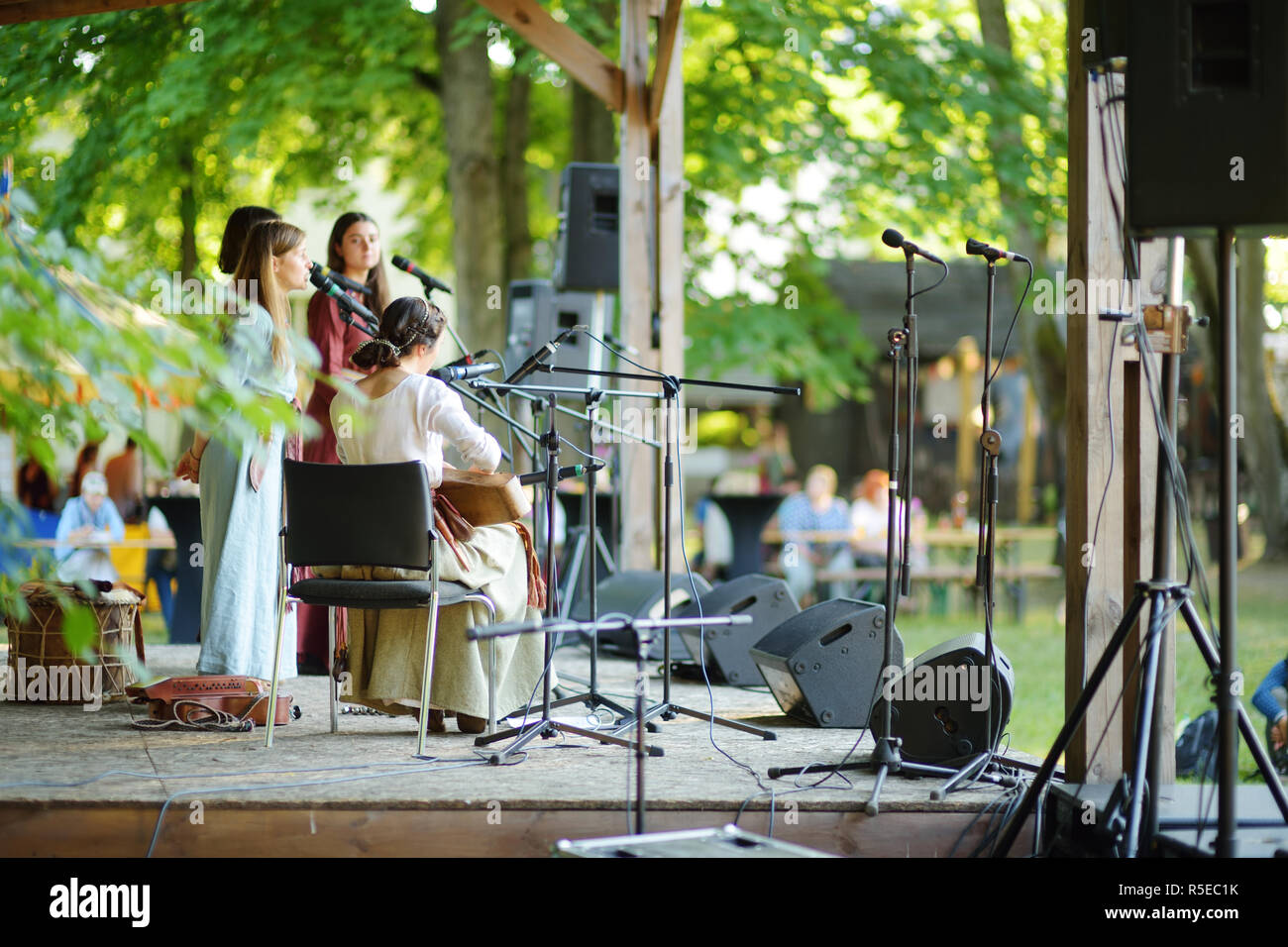 TRAKAI, LITHUANIA - JUNE 16, 2018: Historical reenactment activists playing folk-rock music during annual Medieval Festival, held in Trakai Peninsular Stock Photo