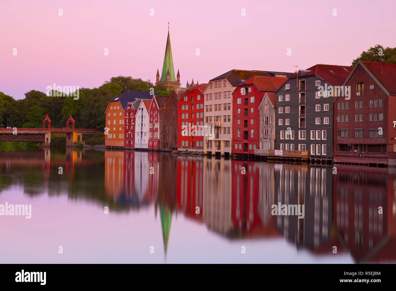 Nidaros Cathedral & Gamle Bybro illuminated at dawn, Trondheim, Sor-Trondelag, Norway Stock Photo