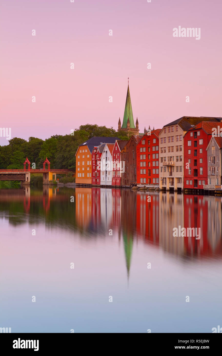 Nidaros Cathedral & Gamle Bybro illuminated at dawn, Trondheim, Sor-Trondelag, Norway Stock Photo