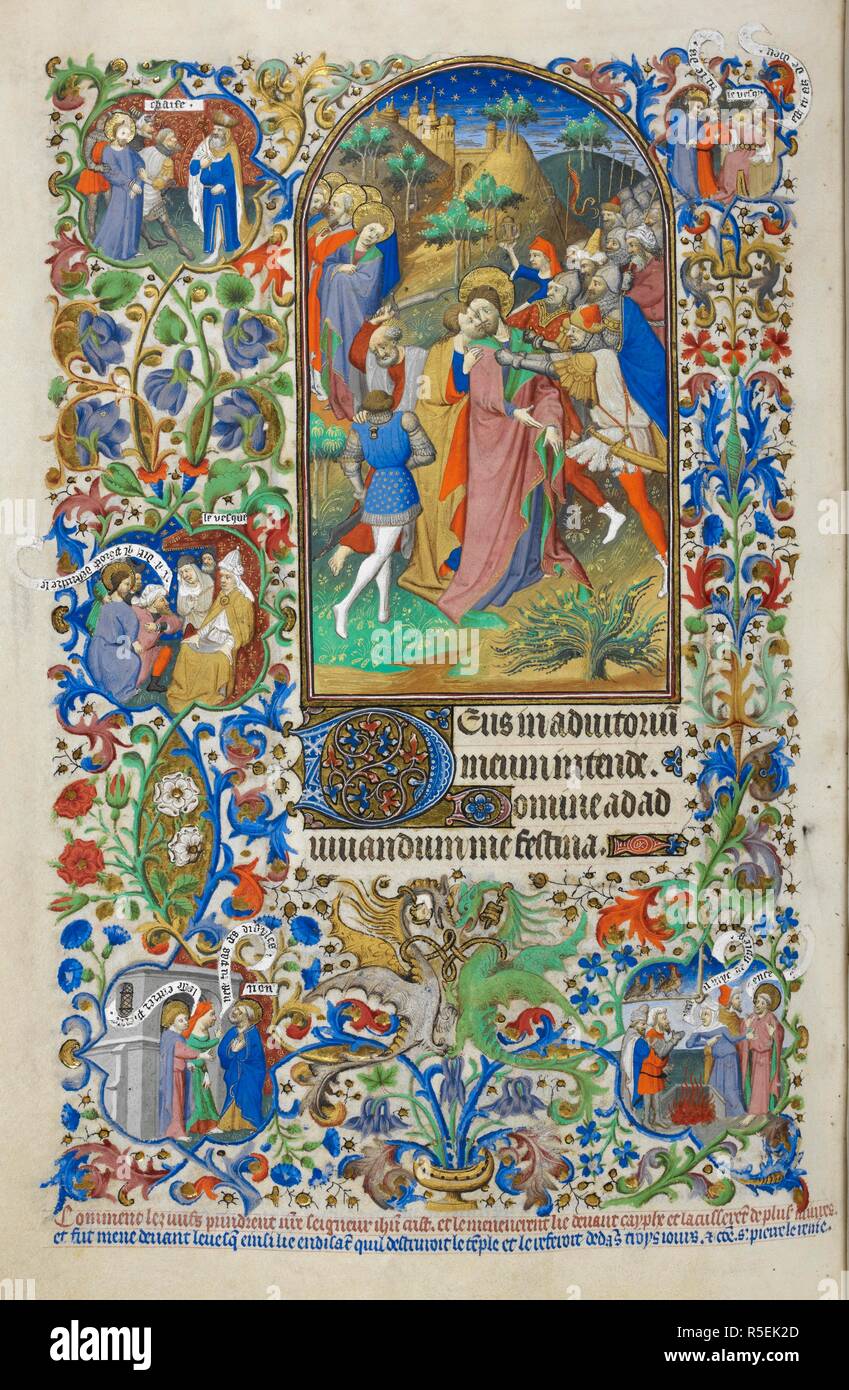 Hours of the Passion [Lauds]. Betrayal of Christ. Text with decorated initial 'D'. Decorated borders with marginal scenes including Christ before Caiaphas and the High Priest, and Peter's denial. Bedford Hours. Paris; 1414-1423. Source: Add. 18850, f.221v. Language: Latin and French. Author: Workshop of the Master of the Duke of Bedford. Stock Photo