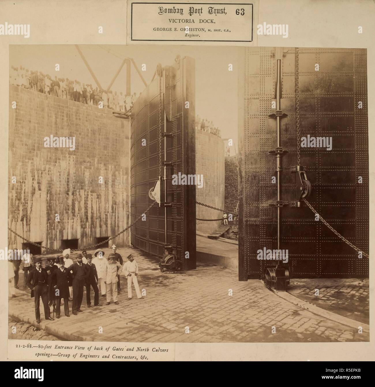 80-feet entrance. View of back of gates and north culvert openings - Group of engineers and contractors, &c. [Victoria Dock construction, Bombay]. Bombay Port Trust. Prince's Dock Extension Works. 21 Feb. 1888. Photograph. Source: Photo 173/(63). Language: English. Stock Photo