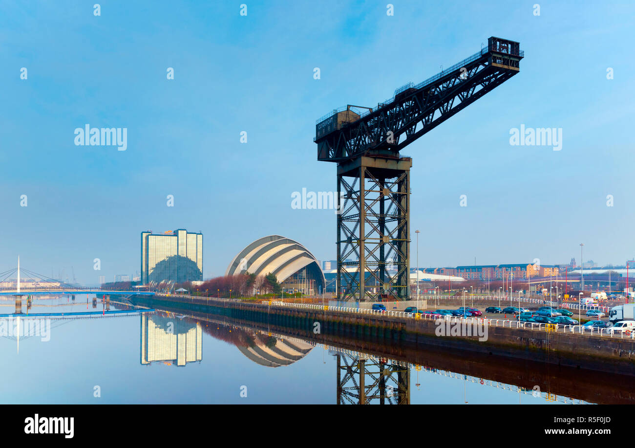 UK, Scotland, Glasgow, Scottish Exhibition and Conference Centre SECC, or Armadillo, and Finnieston Crane beside River Clyde Stock Photo