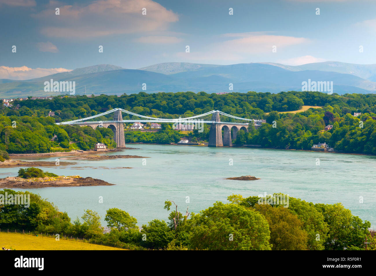 UK, Wales, Anglesey, Menai Straits, Menai Suspension Bridge (Pont Grog y Borth) by Thomas Telford Stock Photo