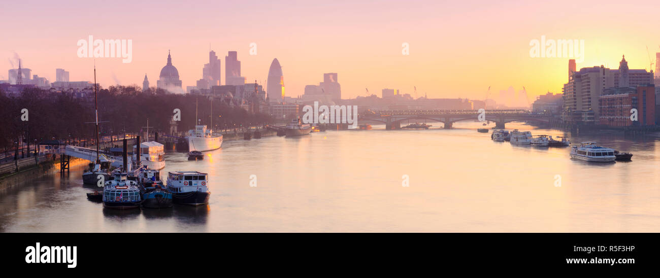 UK, England, London, City of London skyline at sunrise Stock Photo