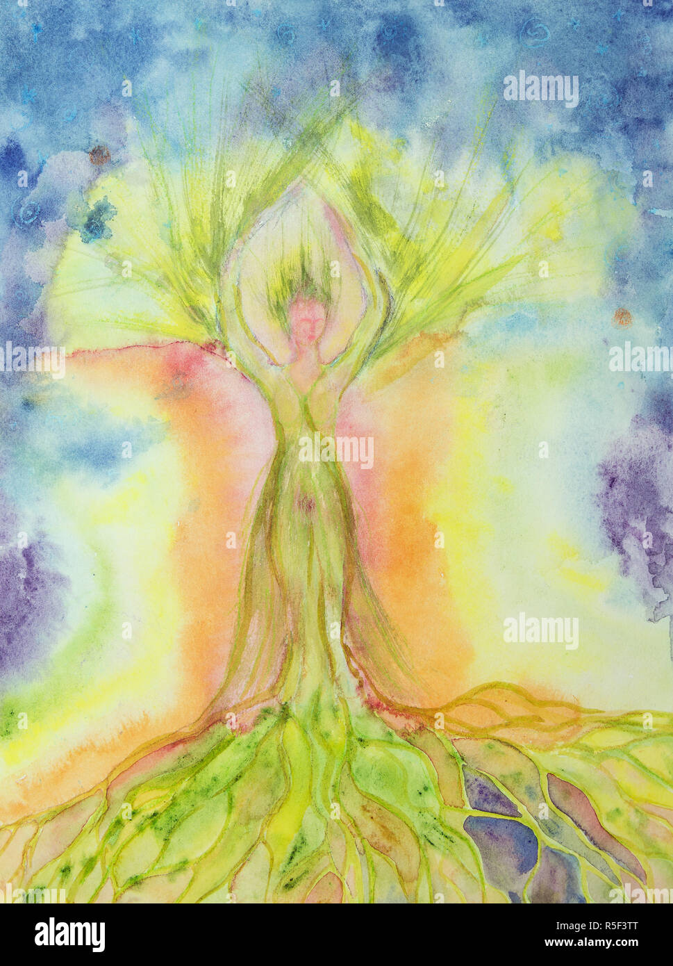 Woman tree of life with aura. The dabbing technique near the edges gives a soft focus effect due to the altered surface roughness of the paper. Stock Photo