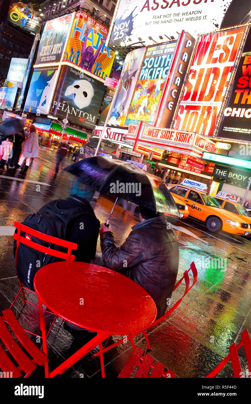 USA, New York City, Manhattan,  Times Square, Neon lights on a rainy night Stock Photo