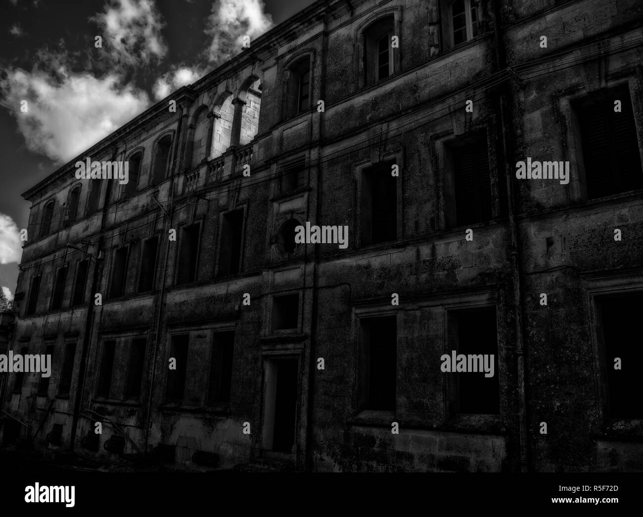 An abandoned building in black and white Stock Photo