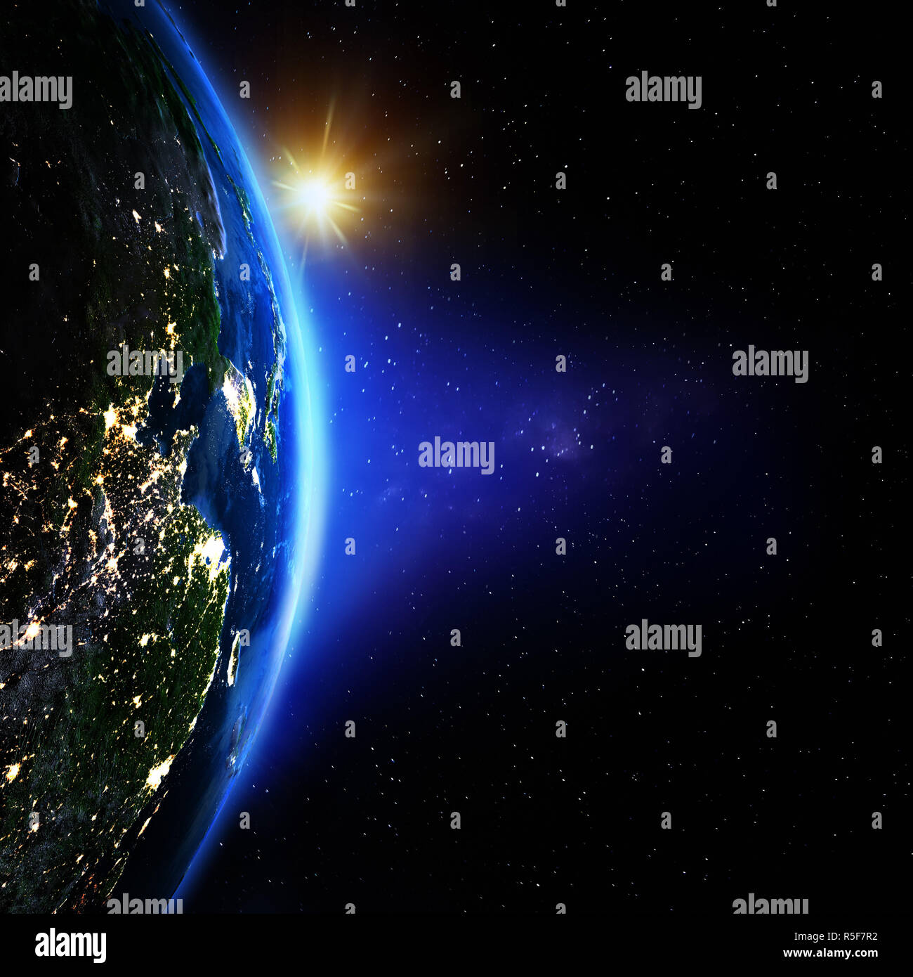 Planet Earth from space sunrise Stock Photo