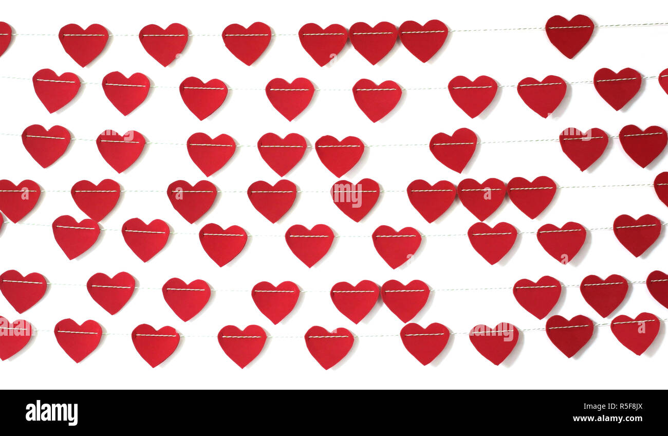 red paper heart hanging on the clothesline. on white background Stock ...