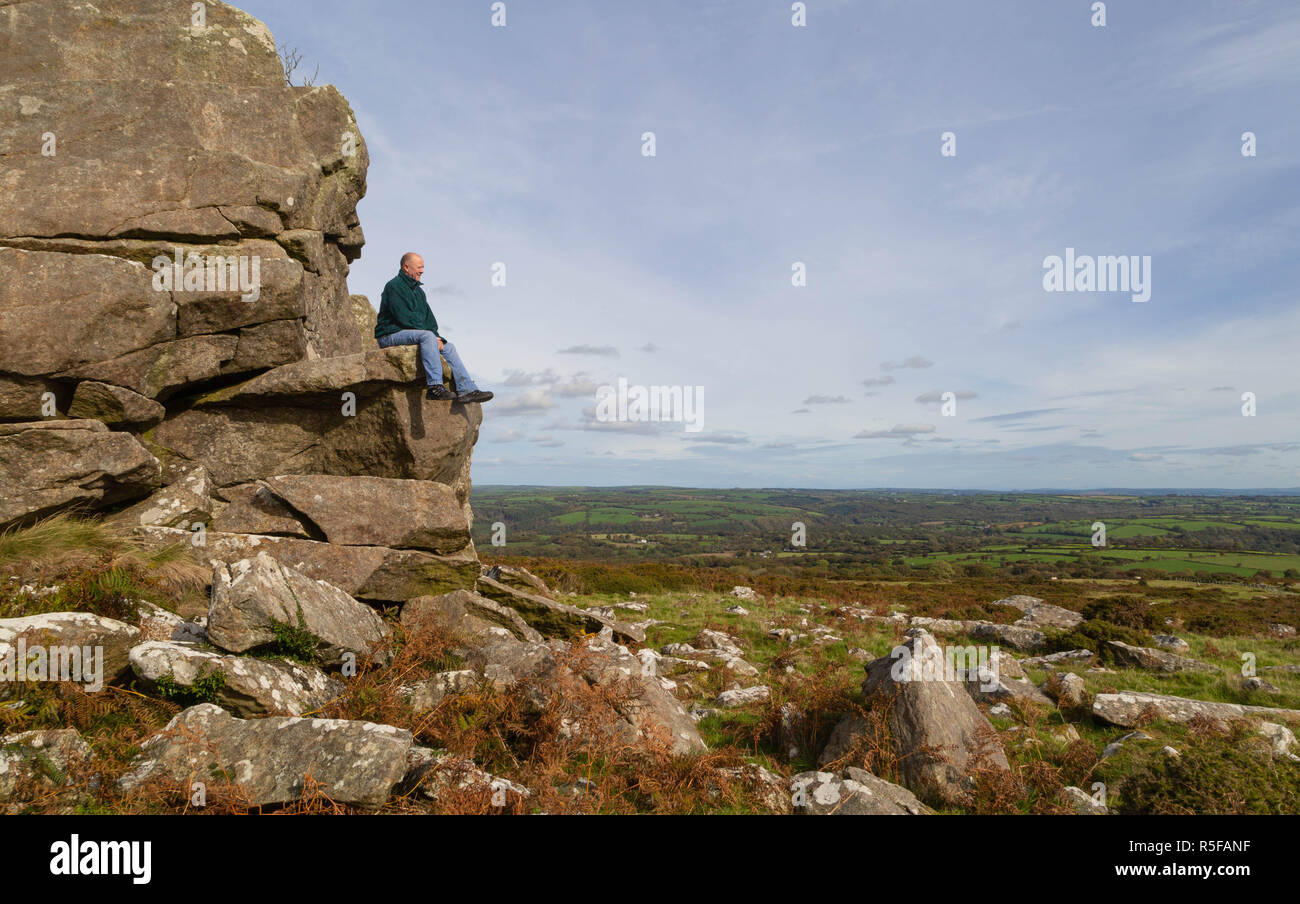 Walking to the top of the Preseli Hills, Pembrokeshire finding a rock  formation that had a perfect seat. Relaxing taking in the views Stock Photo  - Alamy