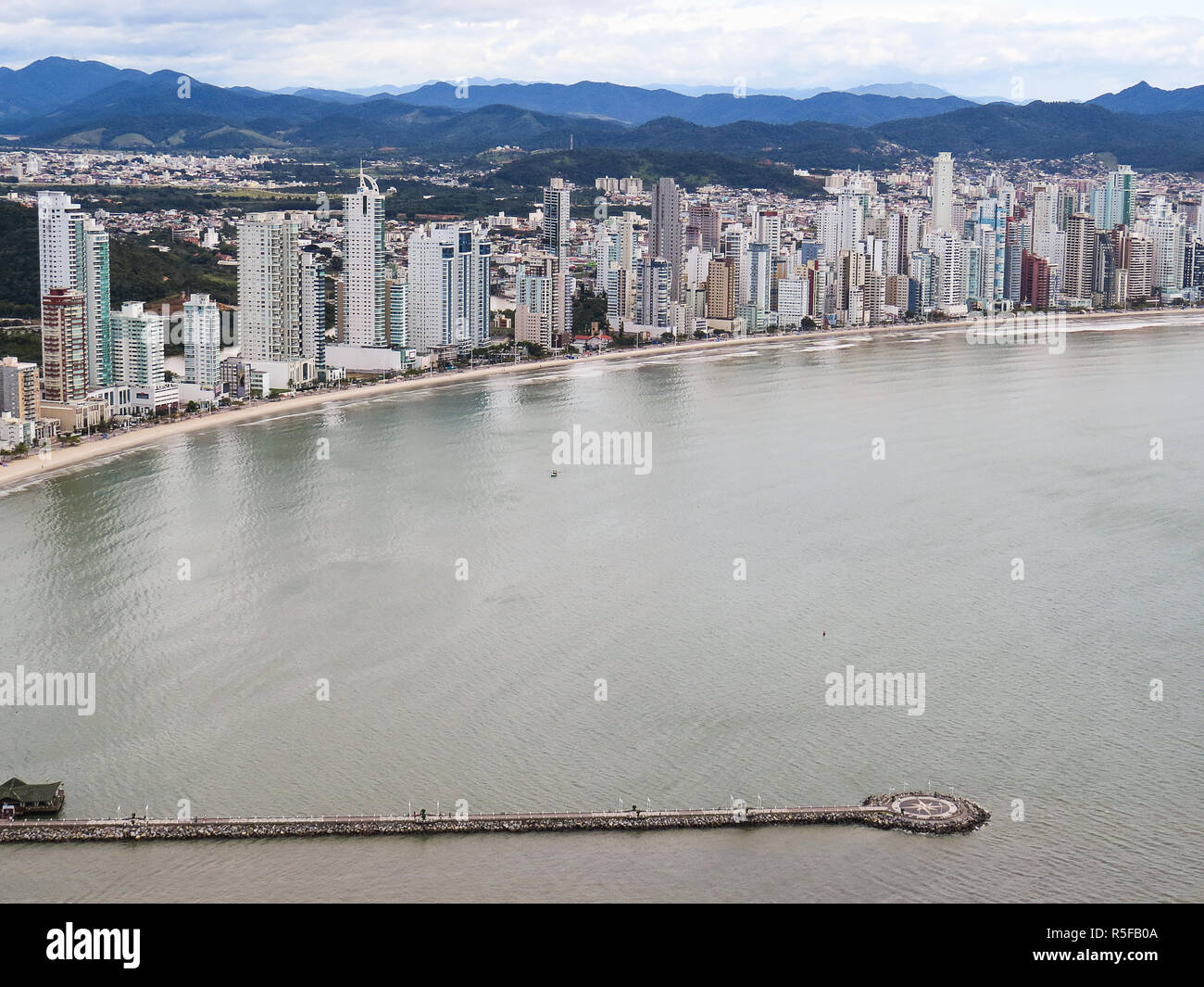 Aerial view of city with buildings by the sea Stock Photo - Alamy