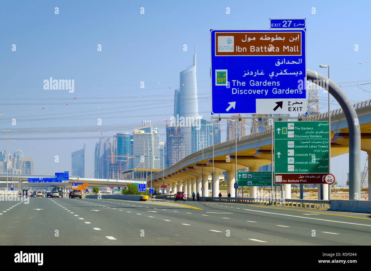 UAE, Dubai, Sign to Ibn Battuta Mall from E11 Highway Sheikh Zayed Road Stock Photo