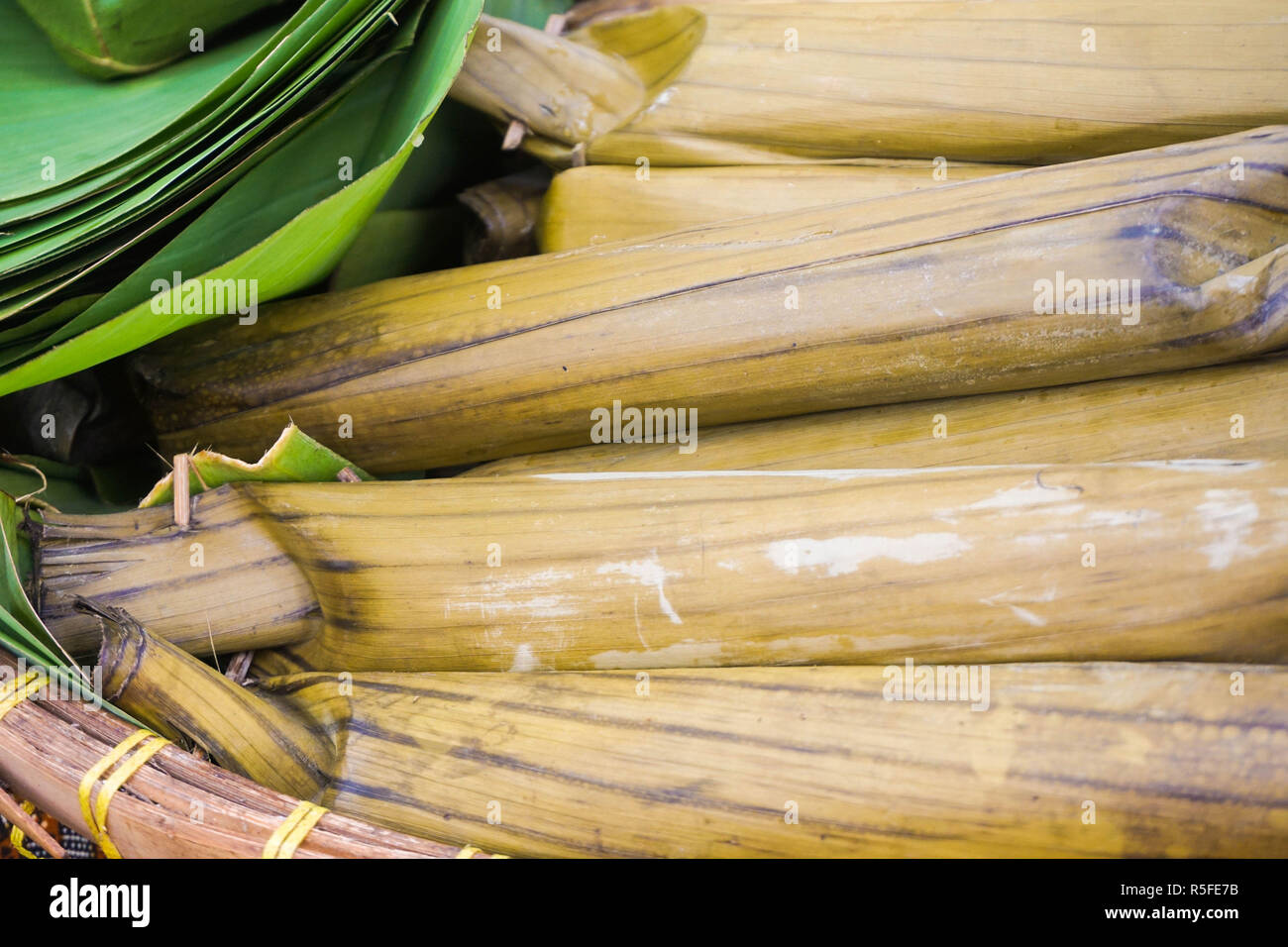 lontong or rice steam wrapped with banana leaf green natural food Stock ...