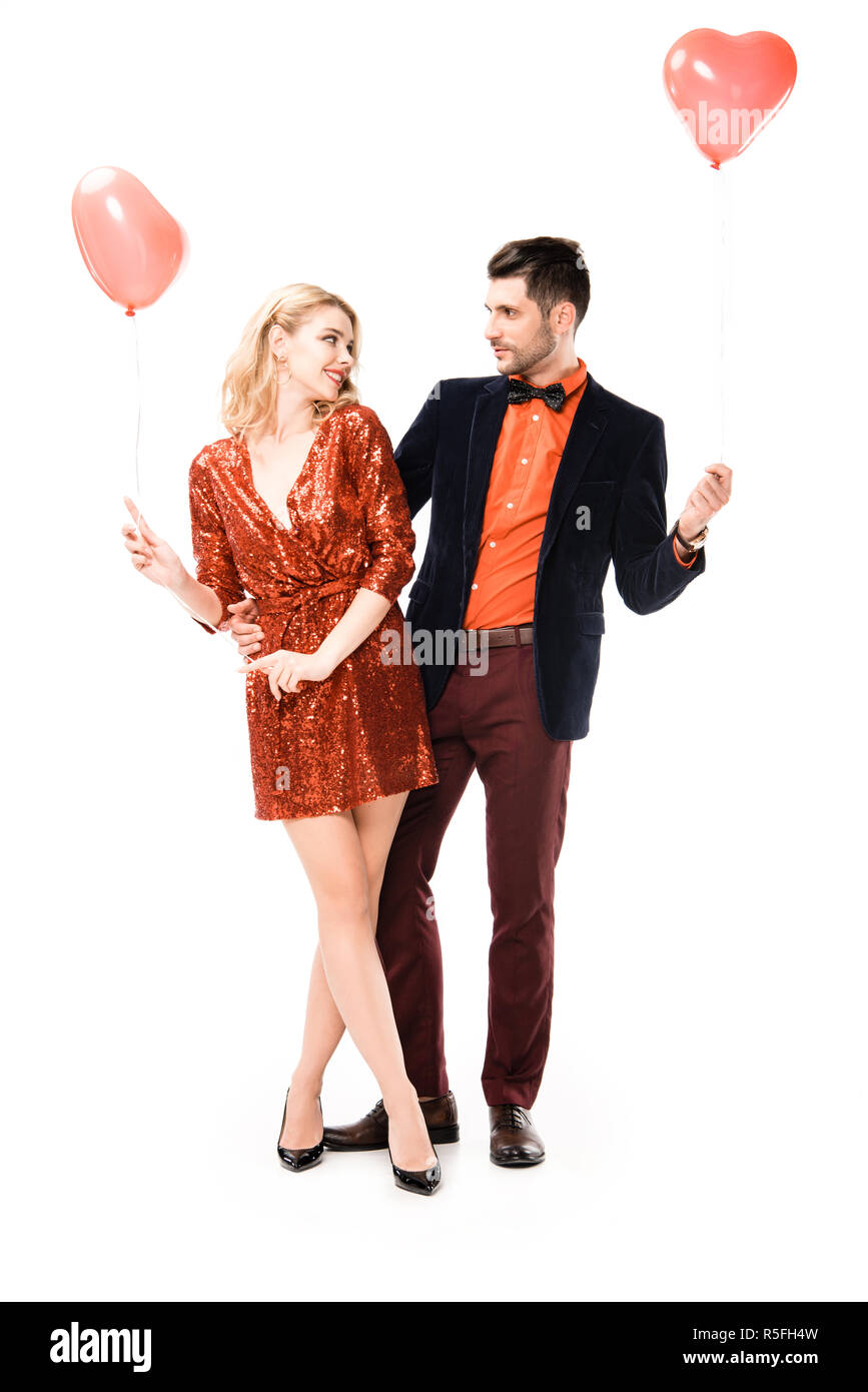 Beautiful romantic couple with red balloons isolated on white Stock ...
