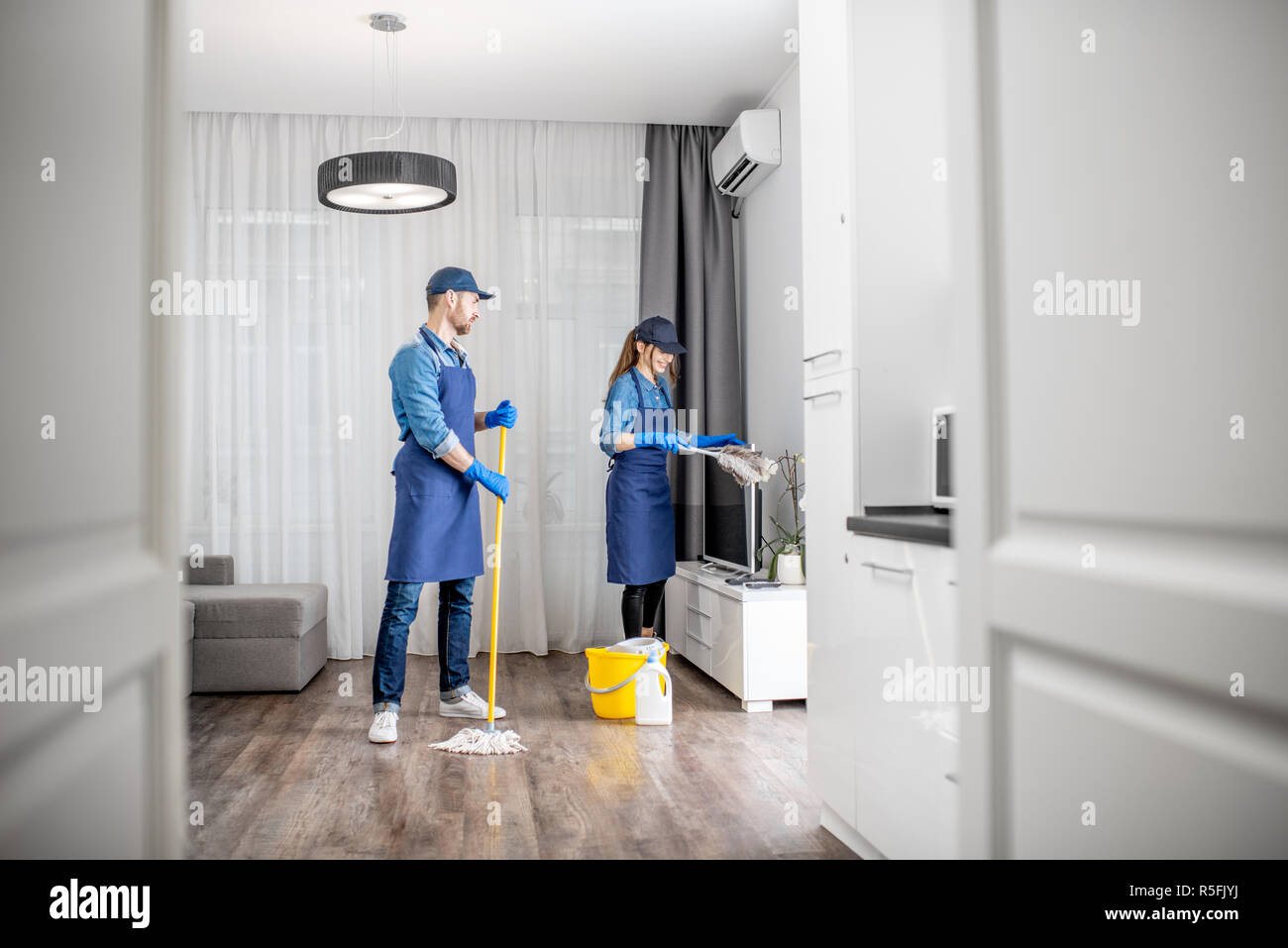 Professional cleaning service in apartment hi res stock photography and Professional cleaning service in apartment hi res stock photography and