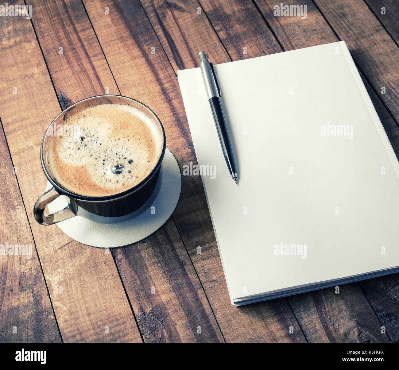 Book, pencil, coffee cup Stock Photo - Alamy