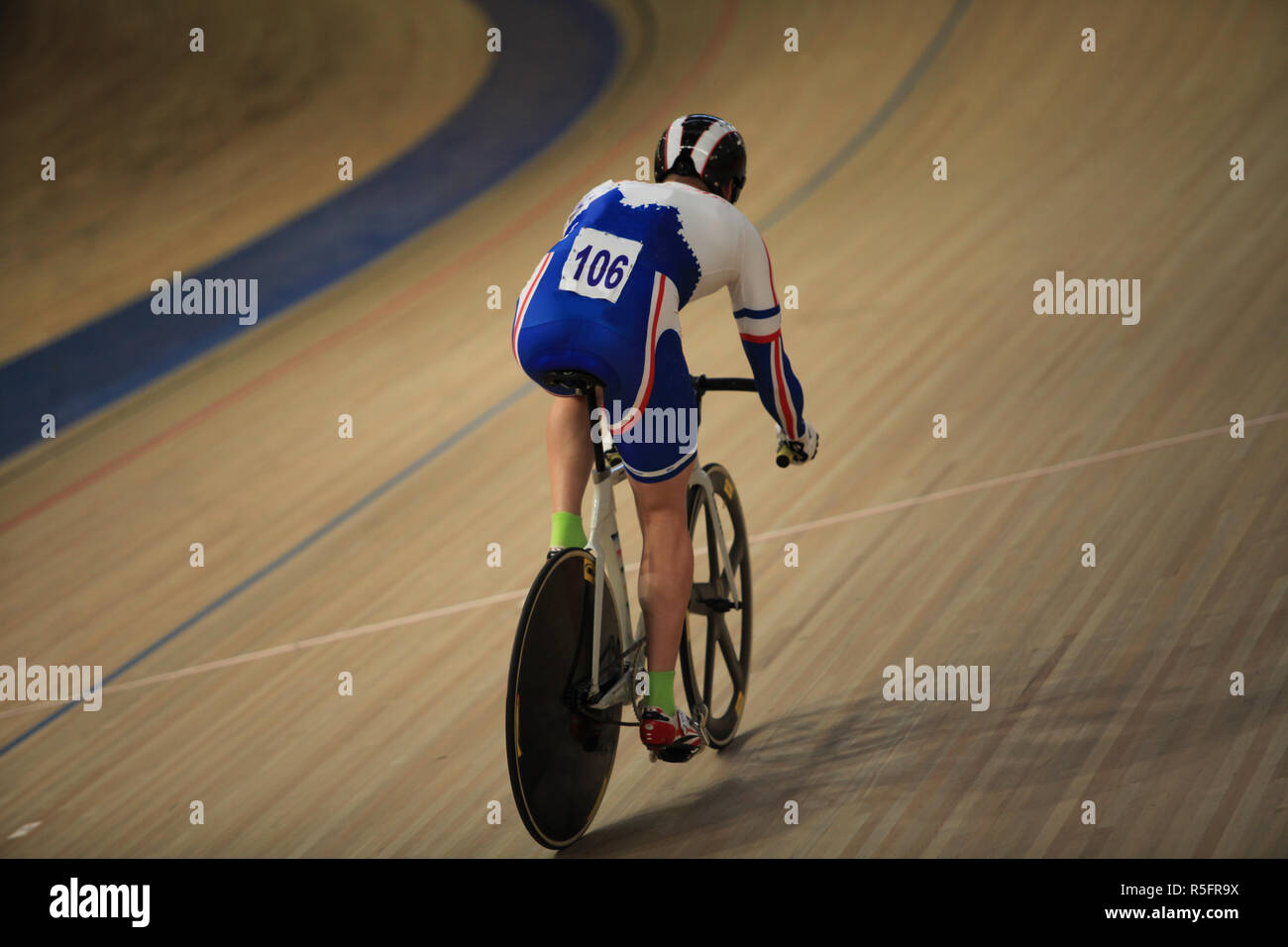 cyclist on a racing bike in Velodrome Stock Photo