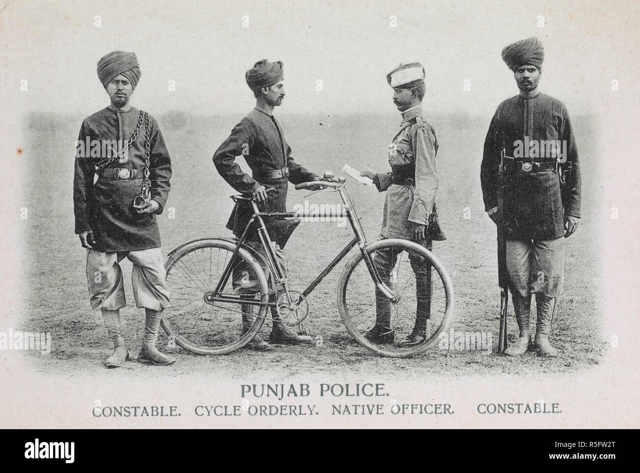 Punjab Police. Constable. Cycle Orderly, Native officer. Constable. [Uniformed group.]. Collection of postcard views of India. India, c.1900. 90x140mm Photogravure and other processes. Photographers: [and/or publishers] The Arch Photo Works of India, Frederick Bremner, Saeed Bros. (Benares), Mela Ram (Peshawar), D. Macropolo & Co. (Calcutta), and others unknown. Source: Photo 504/(29). Stock Photo