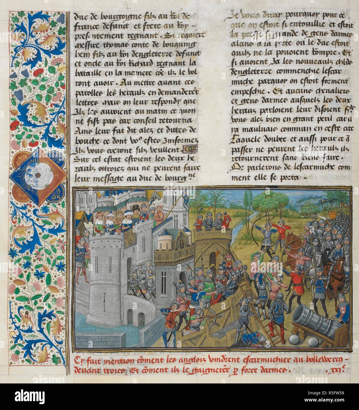 A capture of a bastion at Troyes, with a partial border containing a lozenge bearing a white rose of the York family with the Yorkist badge, 'Dieu et mon droit', at the beginning of chapter 21 of book 1. . Anciennes et nouvelles chroniques d'Angleterre (also known as Recueil des croniques dâ€™Engleterre). France, N. E. (Lille?) and Netherlands, S. (Bruges) Date c. 1470- c. 1480. Source: Royal 14 E. IV, f.59v. Language: French. Author: JEAN OF WAVRIN. Master of the Vienna and Copenhagen Toison dâ€™Or, Master of the White Inscriptions, Master of Edward. Stock Photo