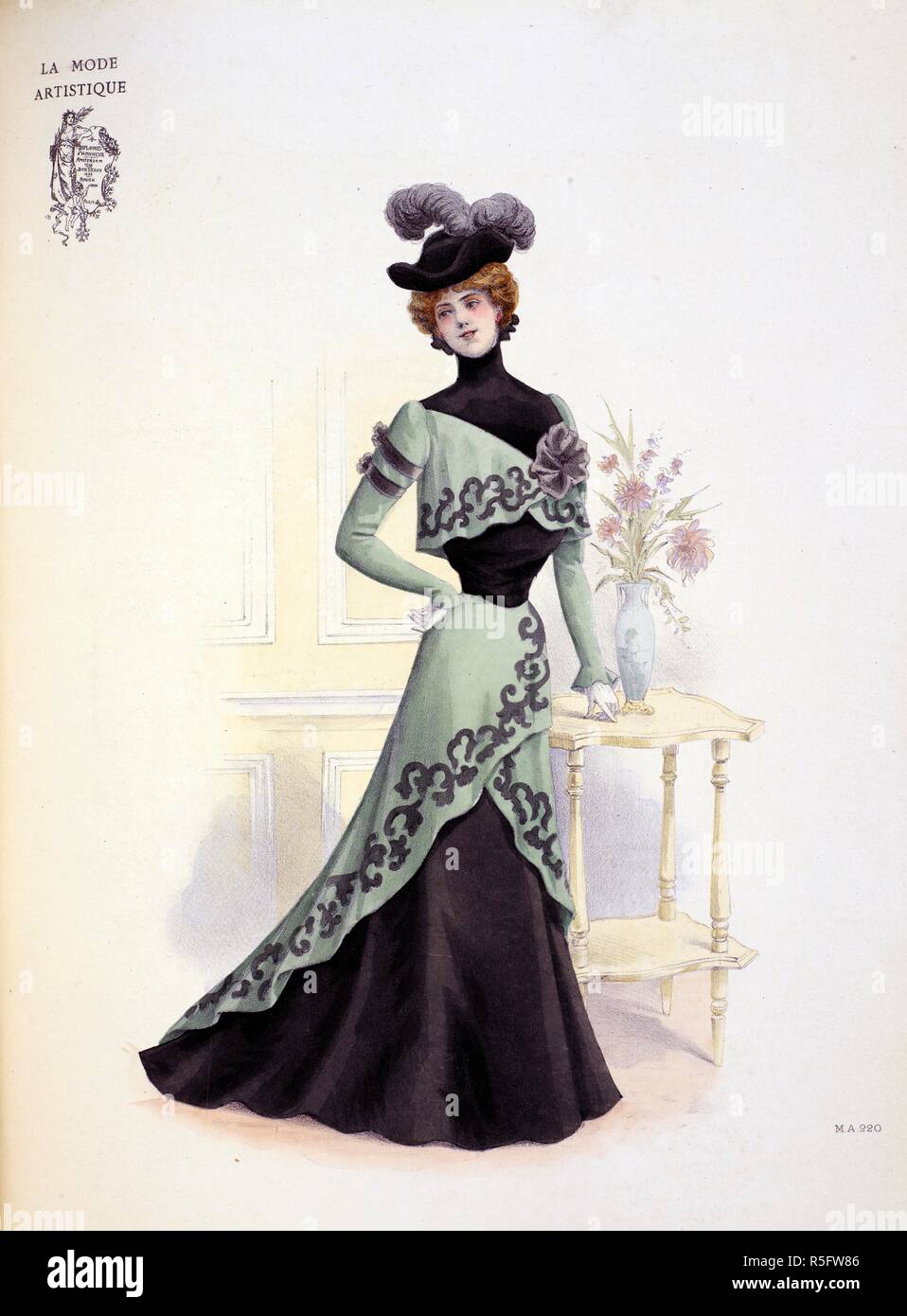Afternoon dress made by Barroin for Mme Norghornoff. The tunic and bolero  are of green cloth, crossed over to the left and trimmed with elaborate  incrustations of black velvet. the skirt and