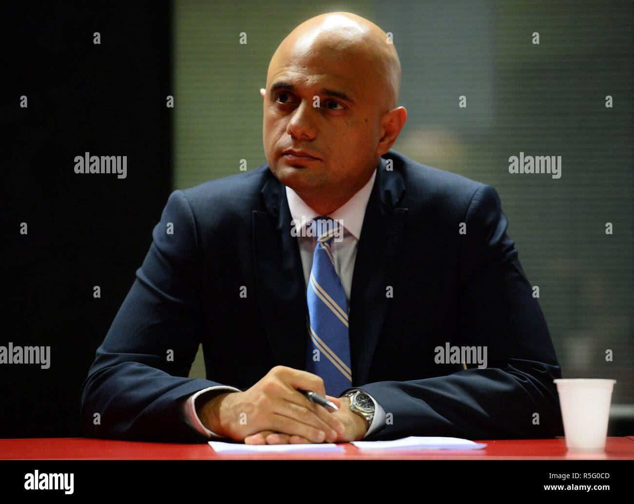 Home Secretary Sajid Javid during a round table discussion on the Prevent anti-terror scheme, at the Chrisp Street Ideas Store in Poplar, London. Stock Photo