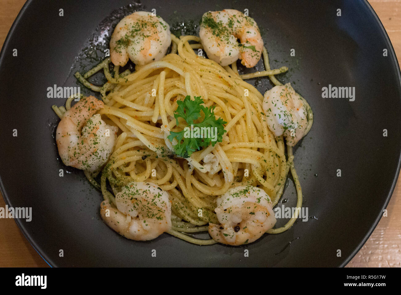 spaghetti aglio olio with shrimp and garlic and herb Stock Photo