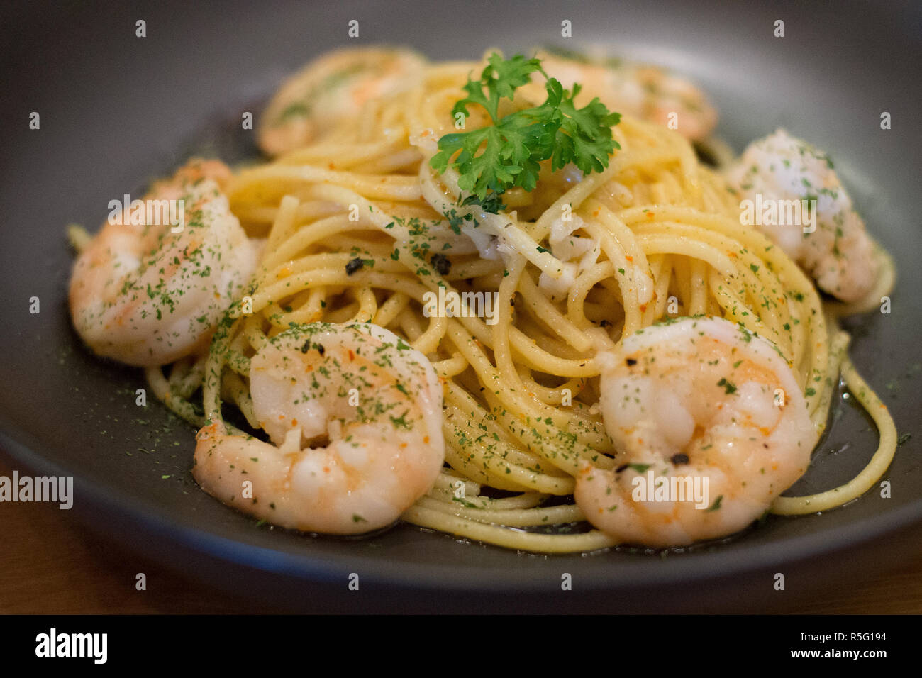 spaghetti aglio olio with shrimp and garlic and herb Stock Photo Alamy