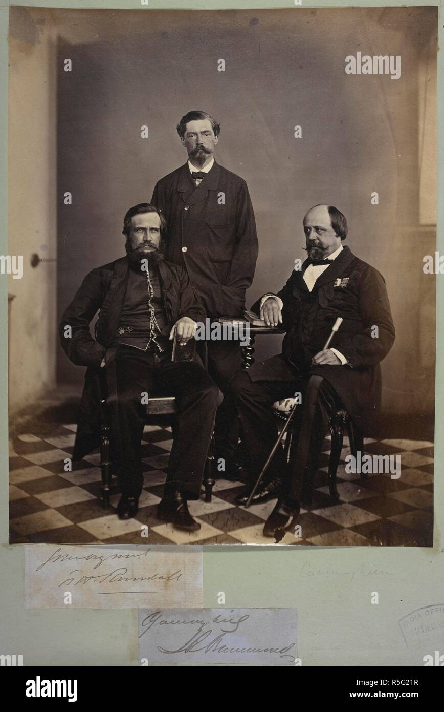 Portrait group of Bengal Engineers. A full-length portrait of three Bengal Engineers, grouped round a table. They are identified as follows: F.W. Randall, Henry Drummond (d.1883), Bengal Engineers 1843-78, and Sir Alexander Cunningham (1814-1893), Chief Engineer NWFP 1858-61. Yule Collection: Album of Portraits. c. 1860. Photograph. Source: Photo 139/1(41). Language: English. Author: UNKNOWN. Stock Photo
